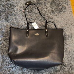 Reversible Coach purse with matching wristlet